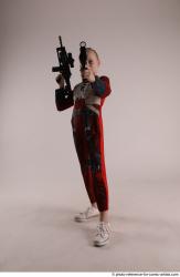 DENISA WITH TWO GUNS